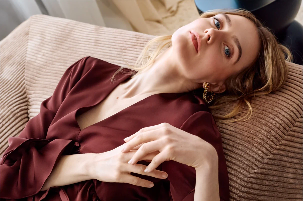 UNDRESS editorial image featuring a burgundy dress